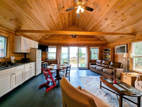 Franklin House | Cabin and Canvas Lakefront Retreat family beach 1dog fire pit