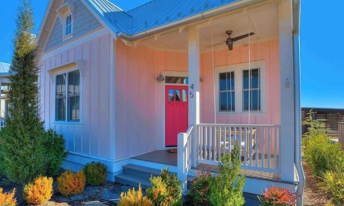 Carlton Landing House | Charming Pink House! Steps to Boardwalk Pool!