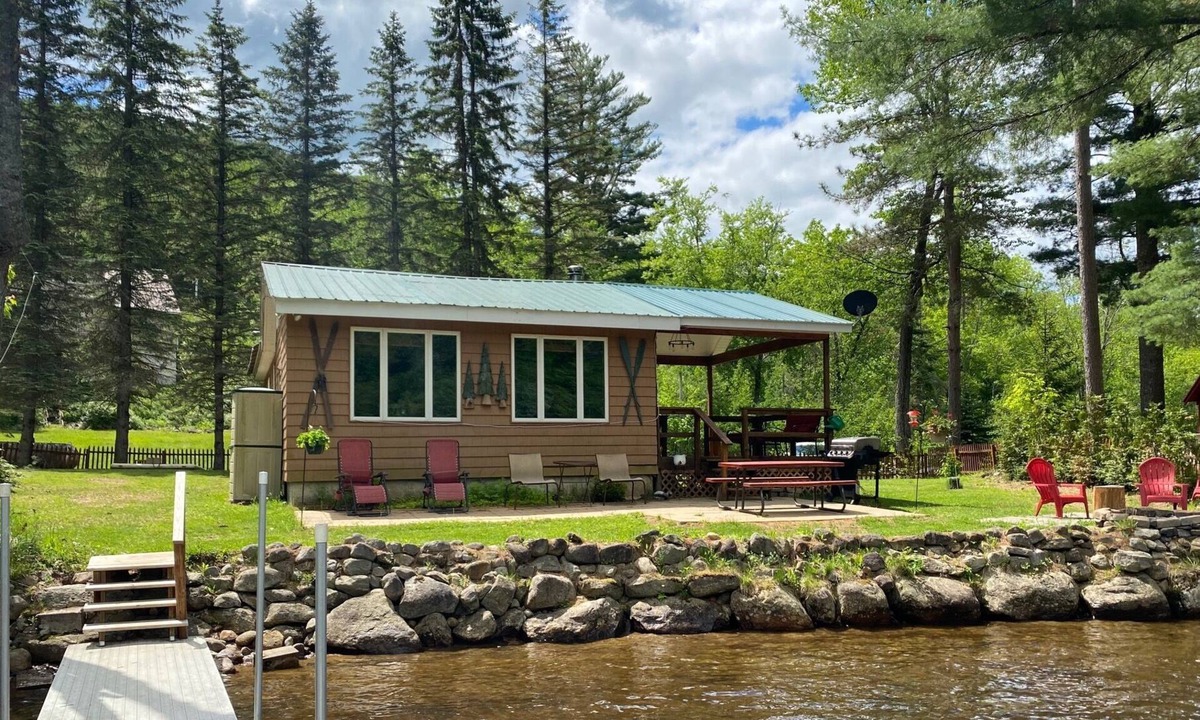 Piseco House | Dog friendly, fenced yard, sitting on the shore of Oxbow Lake