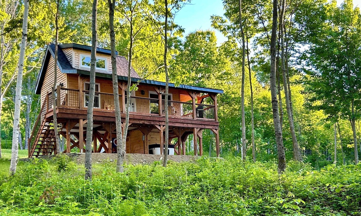 Canterbury Cabin | Elevated cabin nestled among the trees, and the Saint John River. Pet friendly.