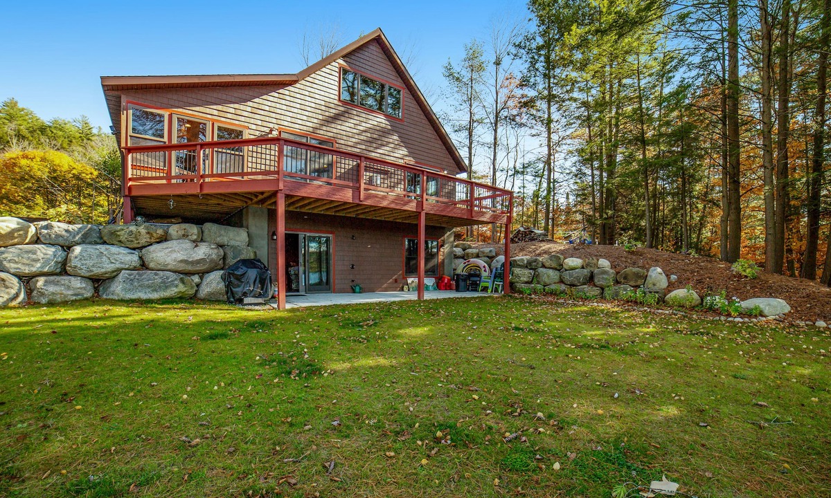 Chestertown House | Gorgeous Lakefront Home with a Fire Pit, Two Living Areas, and a Sunroom