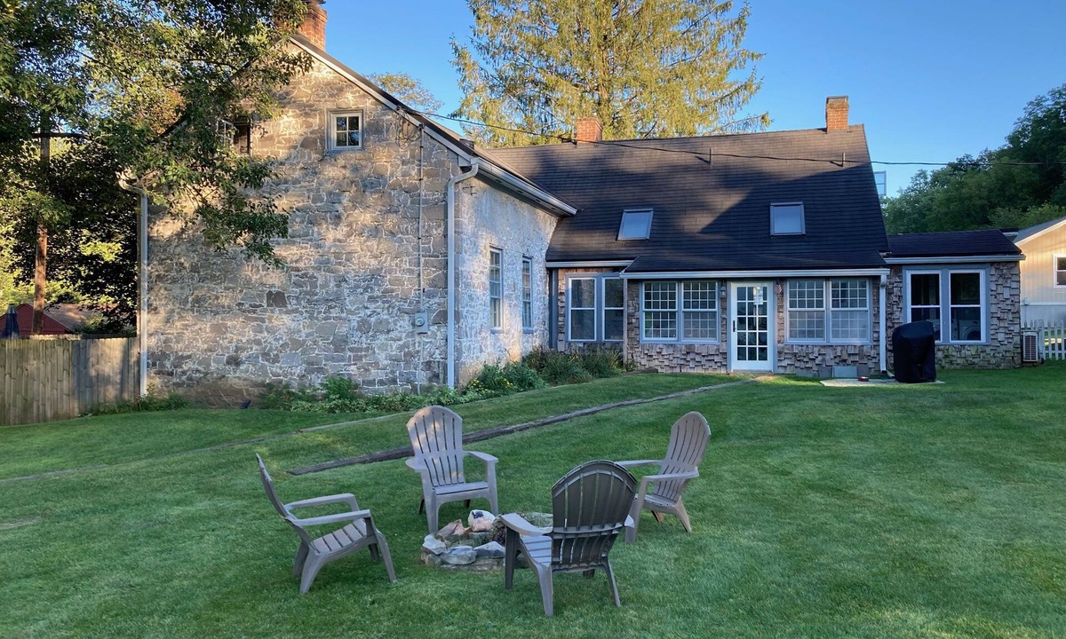 Calvin House | Historic stone farmhouse with rail trail and river access
