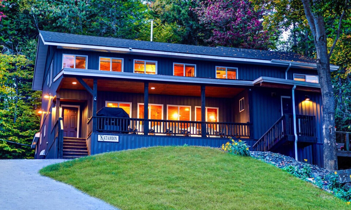 Northeast Somerset Cabin | Katahdin - Cabin 4 · Lawrence`s Lakeside Cabins | `Katahdin`: Boat Dock + Kayaks