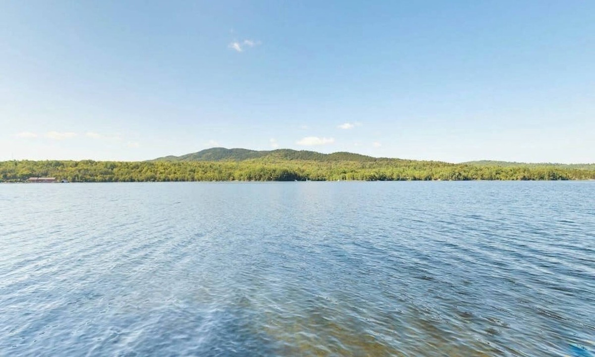 Greenville Junction Cabin | Lakefront cabin with private dock & beach access