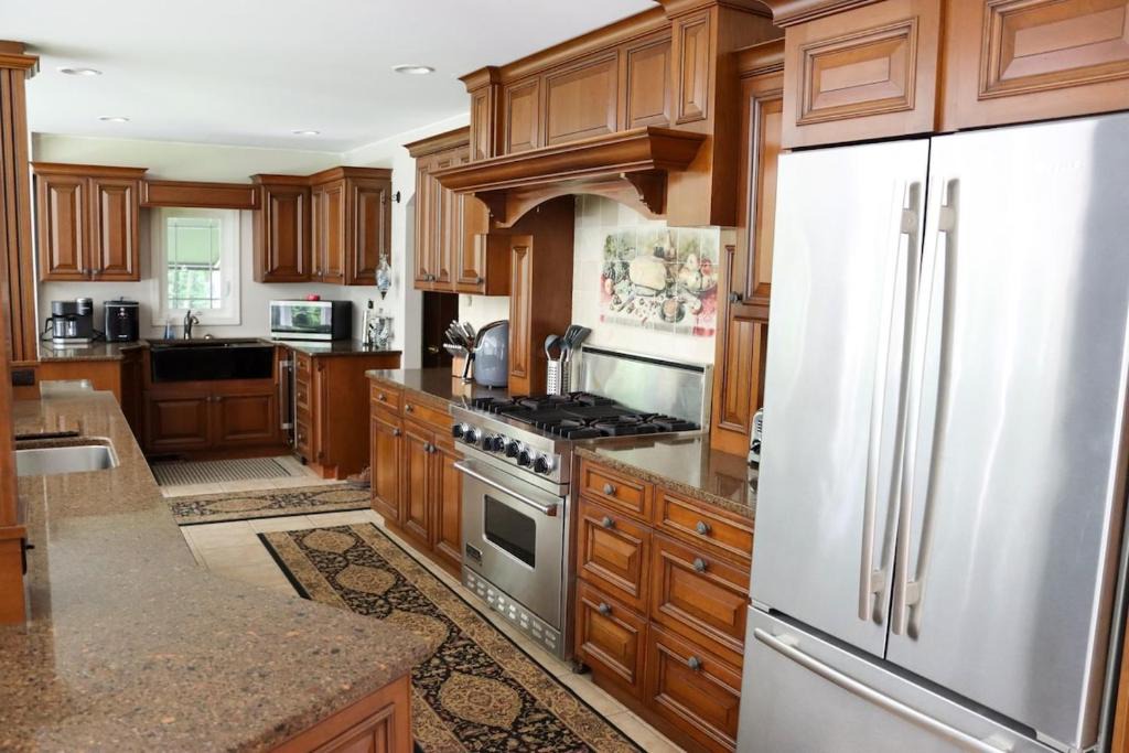 Erie House | Large home with hot tub in serene wooded setting