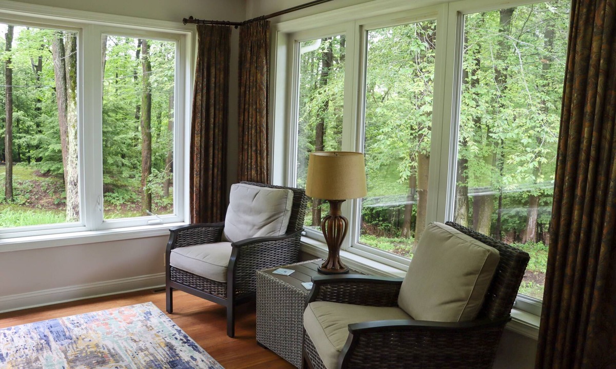 Erie House | Large home with hot tub in serene wooded setting
