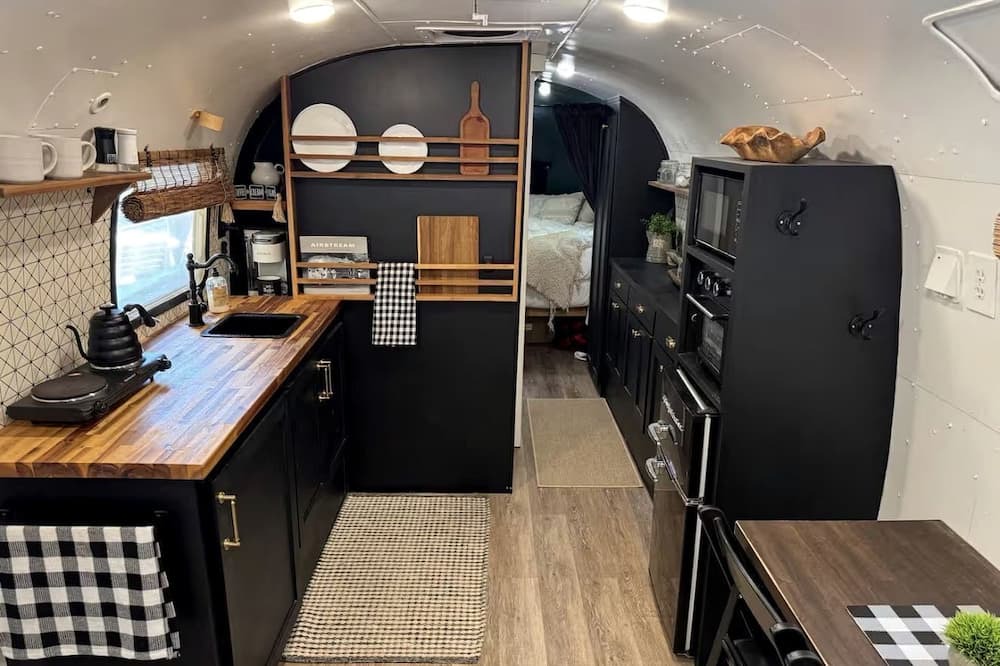 Honey Grove House | Luxurious Remodeled Airstream with Wraparound Deck and Spa near Honey Grove, Texas