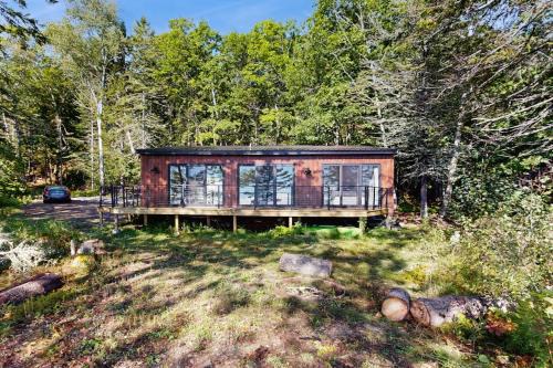 Sandy Point House | Modern Maine cottage with river views, deck, and a convenient washer/dryer