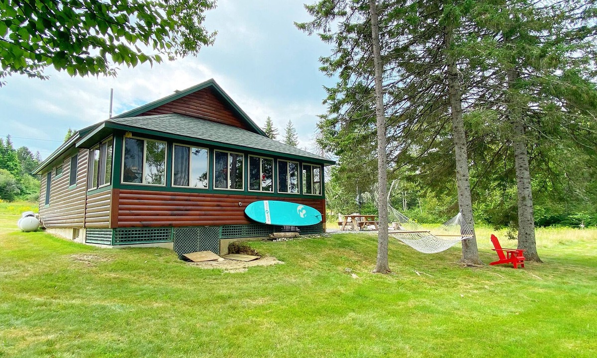 Rangeley Plantation Cabin | Niboban Cabin 5 right on Rangeley Lake with a screened porch, fire pit, hammock, WiFi and dock!