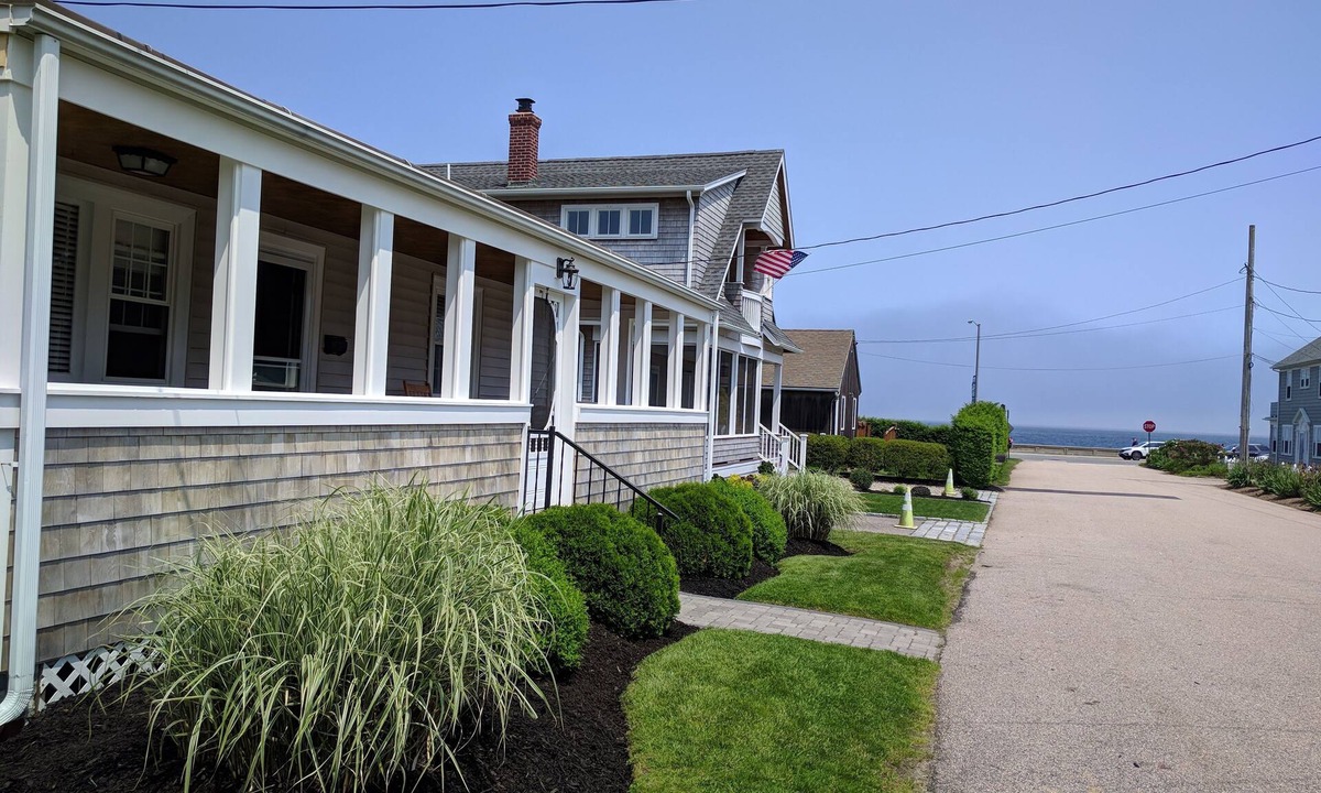 Narragansett Pier Cottage | Ocean view. Feet from the seawall. Price dropped for the final week of summer!