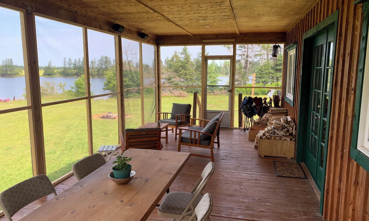 Prince County Cottage | Semi-private beach, huge screened deck, woods on fenced property