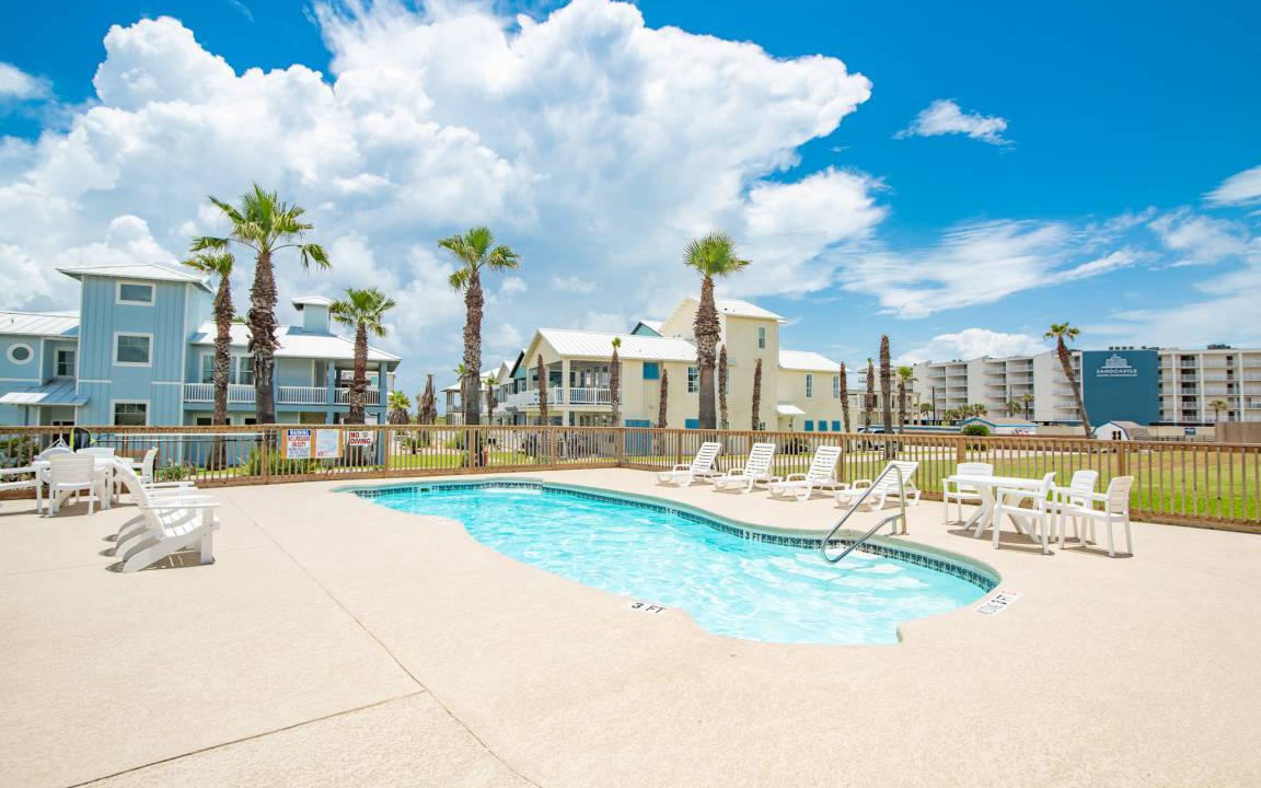 Port Aransas Condo | Sunrise Villas 107- Pool & Boardwalk to the beach