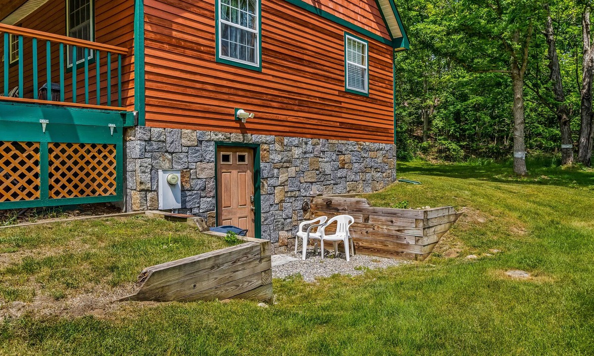 North Lake George Apartment | Walk-out apartment near lake & town with spacious yard, washer/dryer & fireplace