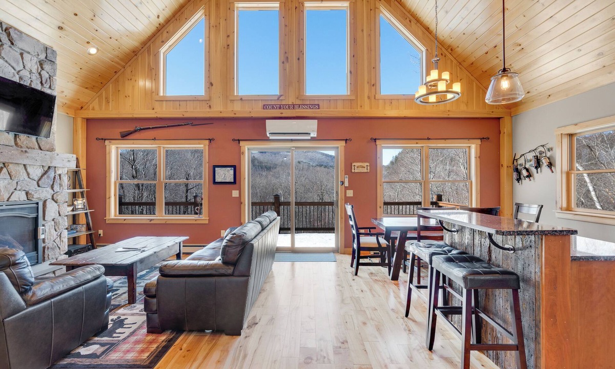 South Pond Shores Ski Chalet | Waterfront Chalet: 4BR Luxury w/Game Room, Private Dock & Minutes to Skiing!
