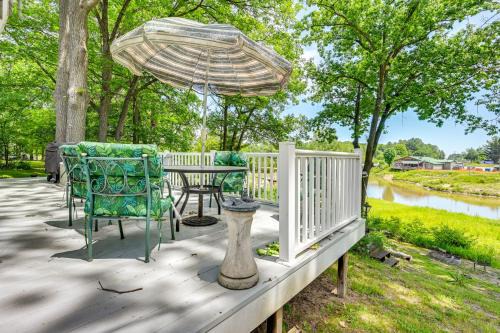 Gladwin House | Waterfront Gladwin Home w/Deck + Fire Pit!