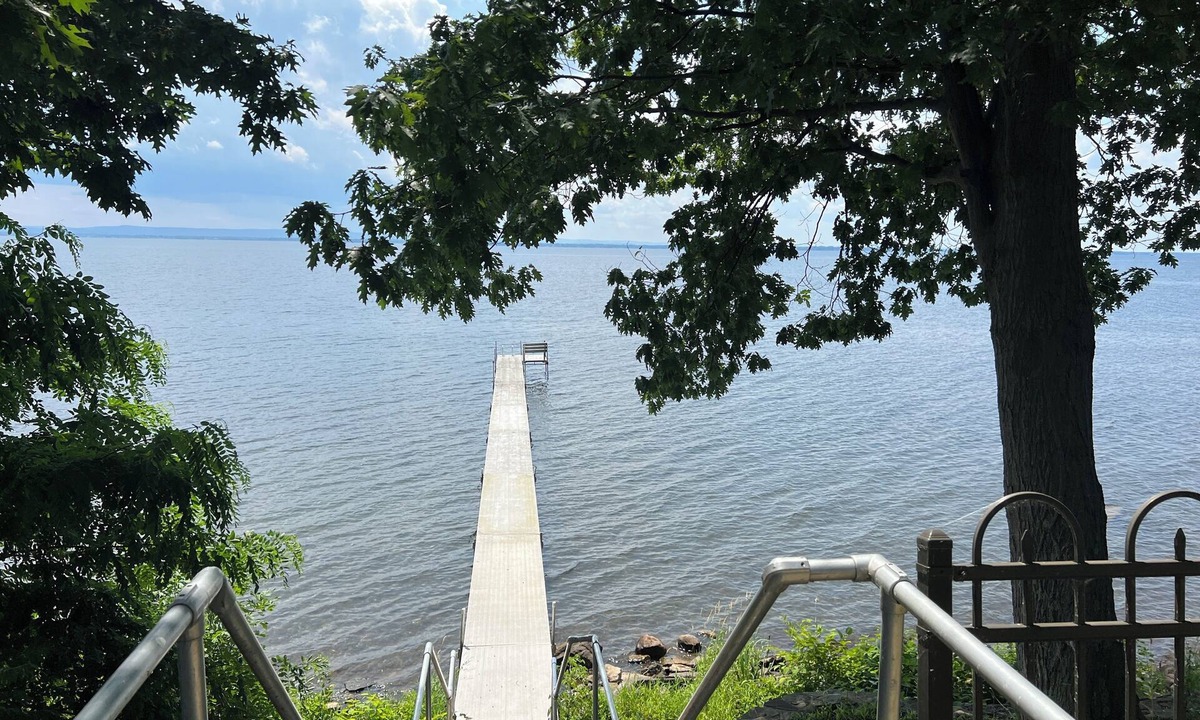 Cleveland House | Waterfront indulgence on Oneida Lake. Bring your boat to this pet friendly home