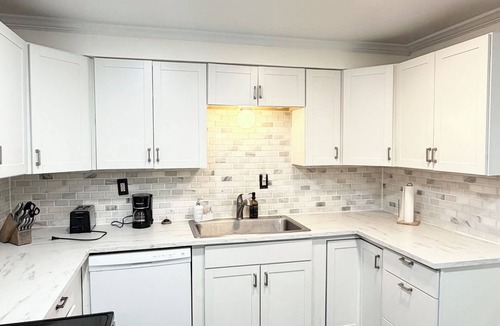 Penn Hills House | 3-bedroom house in vibrant Pittsburgh w/Bar, Sunroom, Deck, and Parking