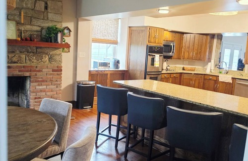 Heath House | 7 woodland Acres, secluded place with Pool, Pickleball, creek, and Hot Tub
