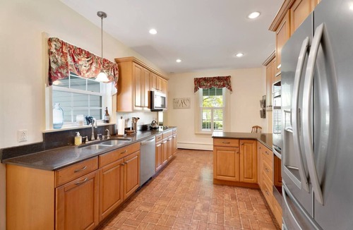 Trumansburg House | A historic, opulent retreat surrounded by sprawling lawns and peaceful countryside beauty.