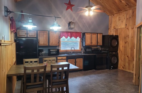Arcade Cabin | A short walk to a private beach for swimming boating or fishing