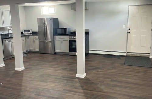 Old Bethpage House | Abundant space with a full kitchen next to trails and golfing