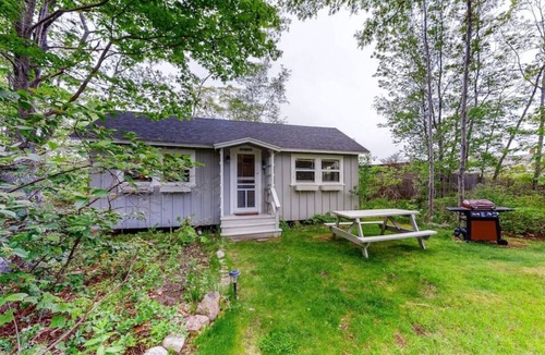 Pemaquid Beach Cabin | Across the road from Pemaquid Beach — wooded king-bed cabin for couples