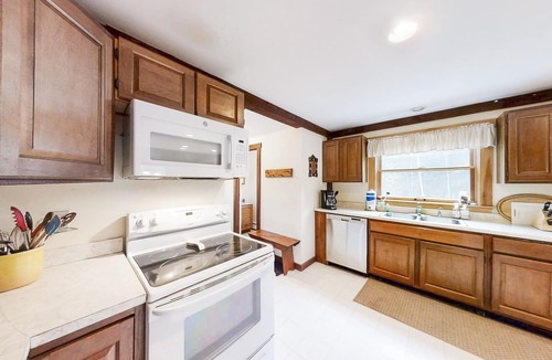 Bayville Cottage | Appalachee Pond Waterfront Cottage | Decks, Sunroom, Dock with Kayaks & Canoe