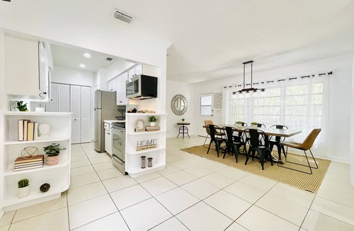 Dolphin Isles House | Bamboo House, Heated pool, Steps from the beach.