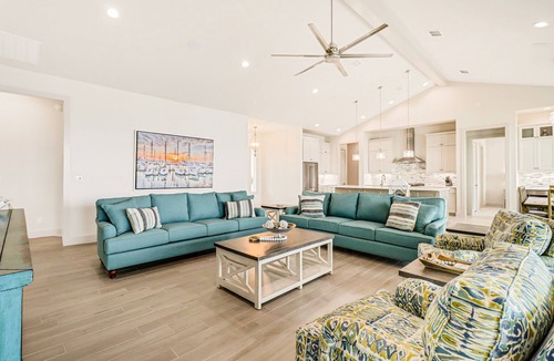 Rockport House | Bayfront water-view home with outdoor pool, lovely patio, hammock, fishing dock