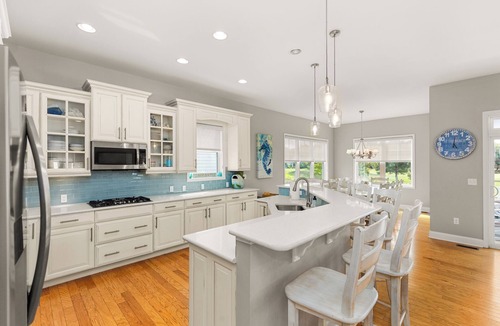 Bayside House | Beautiful 7 bed, 4.5 bath home located in Bayside Resort & Golf Community; Indoor and Outdoor Pools, Fitness Centers, Tennis and Pickleball Courts, and Kayaking/Paddle Boarding.