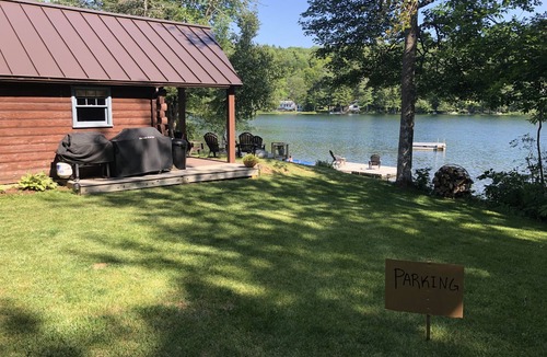 Dedham Cabin | Beautiful cozy Maine log cabin on the water.