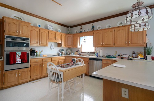 Caine Woods House | Beautiful, modernized four bedroom house located off the bay with sauna, and WiFi just a few blocks from the beach!