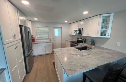 Naples Park Cottage | Blue Water Retreat @ Vanderbilt- steps to beaches/shopping/dining/entertainment!