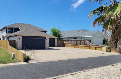 Corpus Christi House | Bottom level canal water front home with spacious deck, boat dock, and parking!
