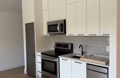 Westbank Apartment | Bright Beach Studio – Steps from Ocean Access | King Bed + Patio
