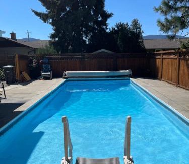 Okanagan-Similkameen Apartment | Bright poolside walkout two bedroom basement suite in the Okanagan