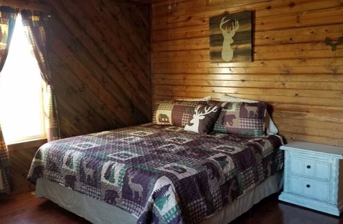 El Dorado Springs Cabin | Cedar Lodge is quaint rustic lodge with modern amenities. Relaxing and warm!