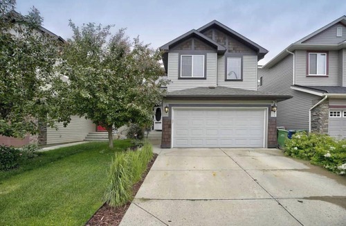 Cranston House | Charming Basement Suite with Parking & Laundry