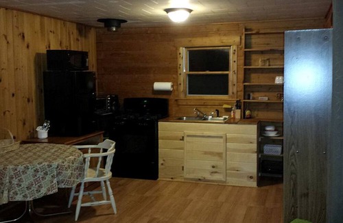Exeter Cabin | Charming Cabin Rental with Private Front Deck near Bangor, Maine