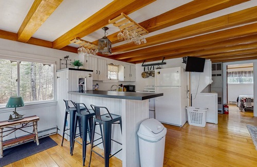 Greenville Junction Cabin | Charming Maine cabin with wood stove, firepit, high-speed WiFi, grill, and deck