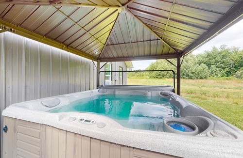 Branchport House | Charming retreat with private hot tub, fireplace, & furnished patio