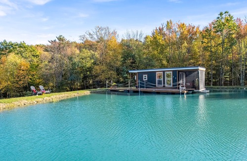 Brackney Boat Rental | Charming Tiny Houseboat Cozy Front Porch Literally on the Water!