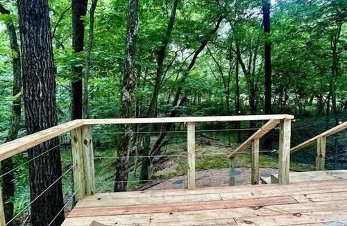 Gentry RV Rental | Charming Woodland Glamping Tents with Fire Pit and Elevated Decks near Gentry, West Virginia