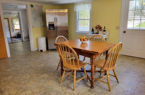 Sebascodegan Island House | Classic Maine House, wrap around deck, water activity a walk away.