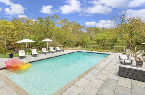 Westhampton House | Classic-style Hamptons home, heated freshwater pool, fire pit, extensive.