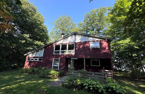 Sackets Harbor Cabin | Clean, Rustic 4-bedroom cabin nestled in the woods in Sackets Harbor