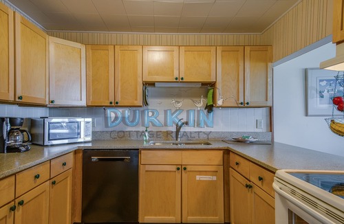 Eastward Look House | Condo with ocean views across the street from the beach
