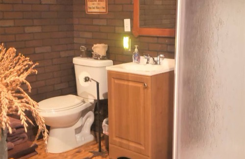 Cleburne Cabin | Cowboy Hotel in Western Town w/Saloon & Firepit!