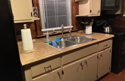 Bonnet Shores Cabin | Cozy Beach Log Cabin Walk to Private Beach Cabana Bar Fire Pit Sleeps 6