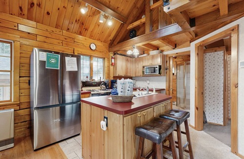 Beaver Cove House | Cozy cabin with covered porch, firepit, grill, fireplace, & washer/dryer